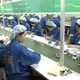 Workers silently celebrate the new guidelines during a company-sanctioned "moment of appreciation."